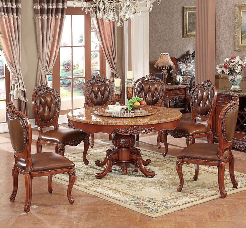 Mesa de comedor redonda de m&aacute;rmol y madera de roble marr&oacute;n vintage con alfombra