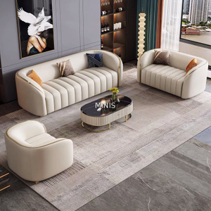Sala de estar moderna de cuero blanco con elegantes sof&aacute;s de 1+2+3 plazas
