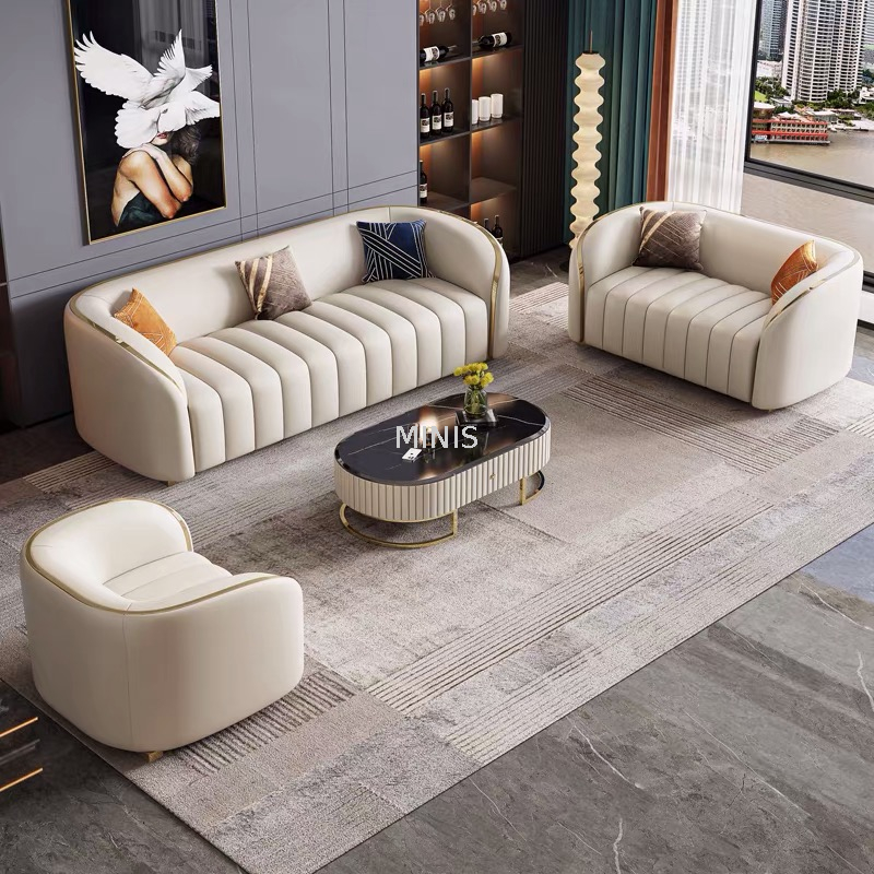 Sala de estar moderna de cuero blanco con elegantes sof&aacute;s de 1+2+3 plazas